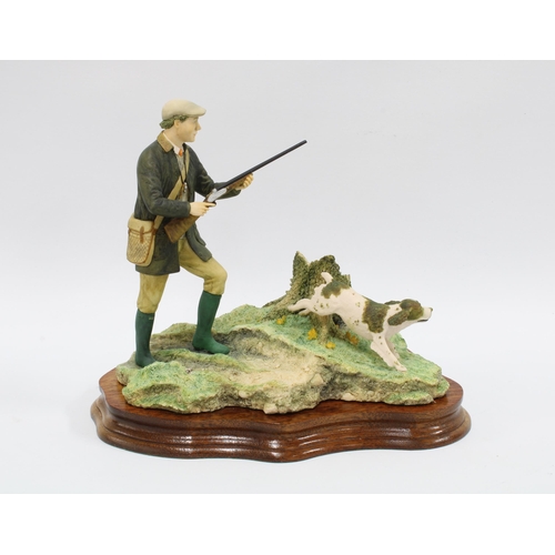 92 - Border Fine Arts 'Dogging 'em Up - Spaniels (Liver/White)' by Ray Ayres, 1988, on wooden base, 20cm