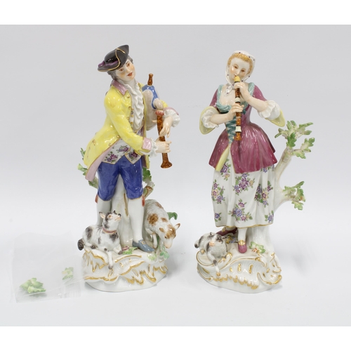 99 - A pair of Meissen porcelain Shepherd and Shepherdess porcelain figures, the male figure with impress... 