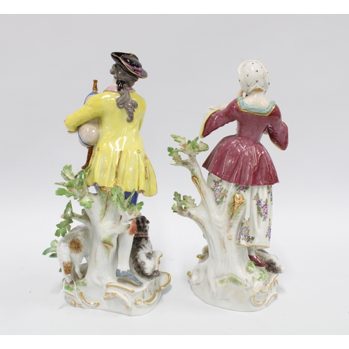 99 - A pair of Meissen porcelain Shepherd and Shepherdess porcelain figures, the male figure with impress... 