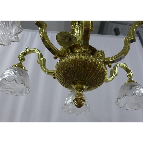 298 - 19th century style brass six branch chandelier, with six glass shades, approximately 62 x 70cm