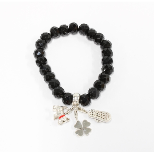 402 - Thomas Sabo black crystal bracelet with three silver charms