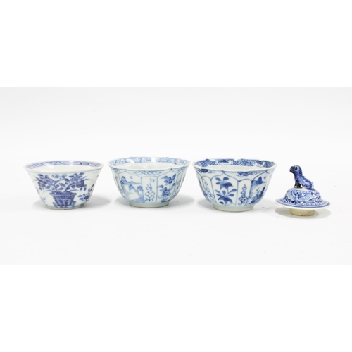 107 - Three Chinese blue and white shipwreck tea bowls, circa 1609, tallest 4cm, together with a foo dog l... 