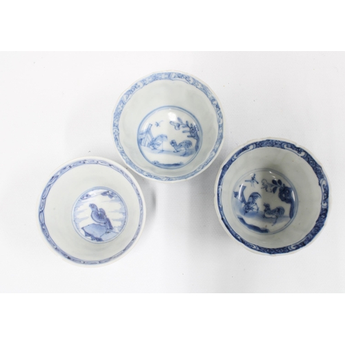 107 - Three Chinese blue and white shipwreck tea bowls, circa 1609, tallest 4cm, together with a foo dog l... 