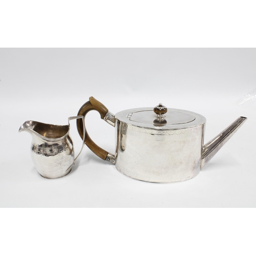 24 - Georgian white metal teapot and a silver cream jug, London 1807 (2)