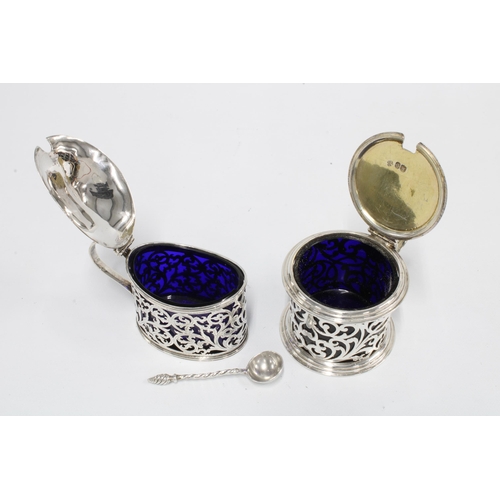 25 - Georgian silver mustard, London 1799, of pierced navette form complete with blue glass liner togethe... 