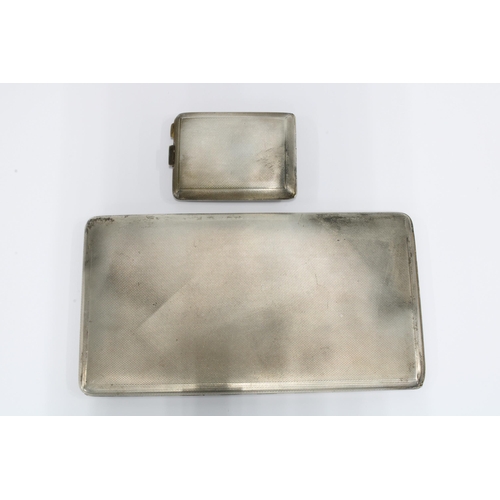 3 - Women's Transport Service silver cigarette case, Birmingham 1939 and a matching smaller silver case ... 