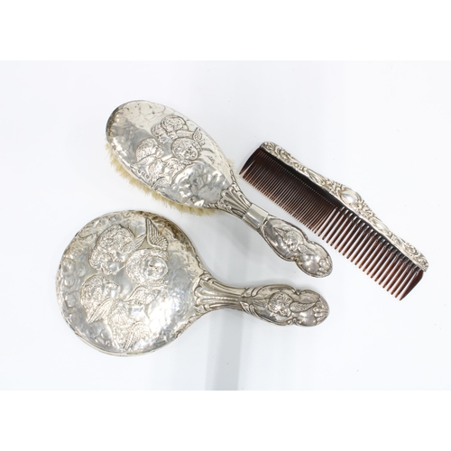 4 - Edwardian silver backed dressing table brush set, Birmingham 1907, comprising a hand mirror, hair br... 
