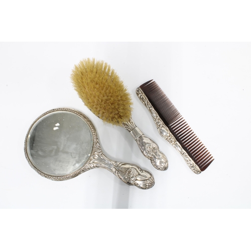 4 - Edwardian silver backed dressing table brush set, Birmingham 1907, comprising a hand mirror, hair br... 