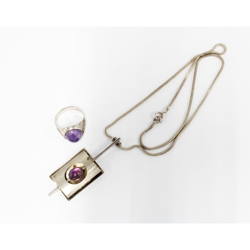 41 - 1970's silver and amethyst cabouchon pendant, London 1977, on a silver snake link chain, together wi... 