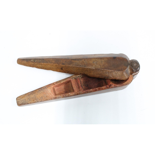 431 - Folk Art treen spice box of elongated coffin shape, 23cm long