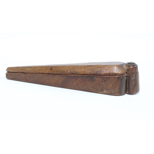 431 - Folk Art treen spice box of elongated coffin shape, 23cm long