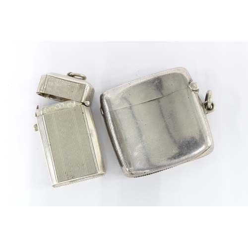 46 - Britannia silver vesta case, London 1902 together with a Victorian silver vesta case by George Unite... 