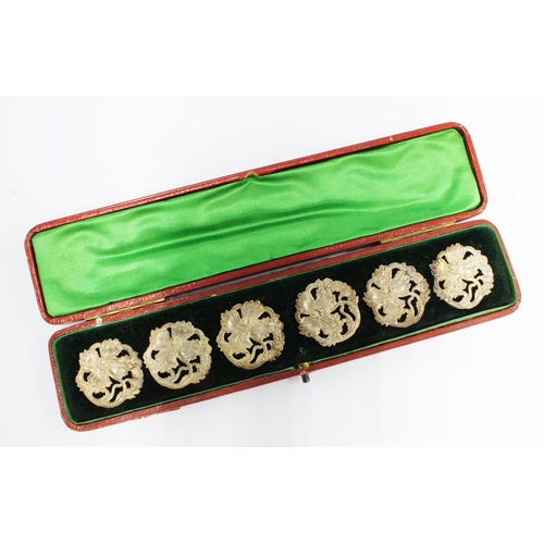 48 - Set of six Art Nouveau silver buttons, Chester 1889, in original fitted leather case (6)