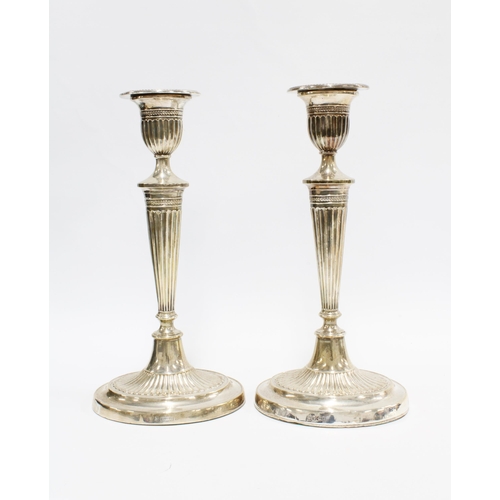49 - AQ pair of late Victorian silver candlesticks, Fordham & Faulkner, Sheffield 1900, of Georgian flute... 