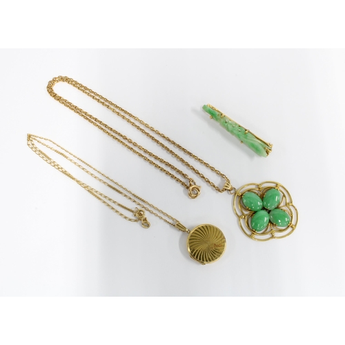 67 - A jade brooch set in unmarked yellow metal, a jadeite pendant in yellow metal frame on a 9ct gold ch... 