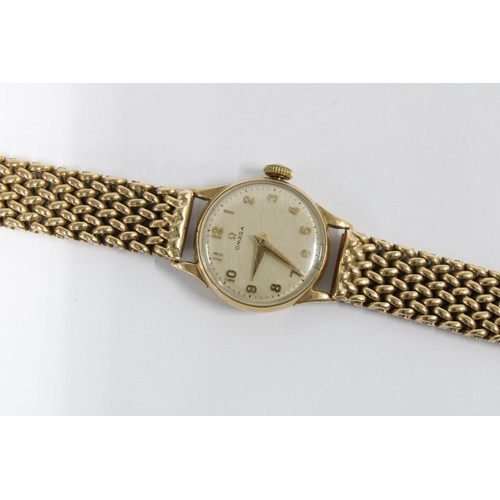 75A - Lady's 9ct gold Omega wrist watch on a 9ct gold bracelet strap, Birmingham 1952