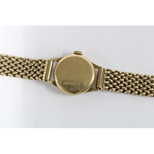 75A - Lady's 9ct gold Omega wrist watch on a 9ct gold bracelet strap, Birmingham 1952