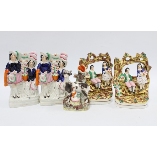 86 - Five staffordshire figures, including a cow with milkmaid spill vase and two pairs, tallest 18cm (5)