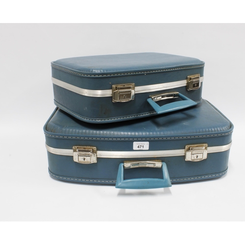 471 - Two vintage pale blue suitcases with keys, graduating in size, larger 51 x 38cm (2)