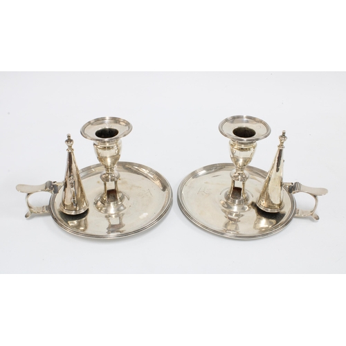 43 - A pair of Georgian silver chamber candlesticks complete with matching snuffers and a detachable scon... 