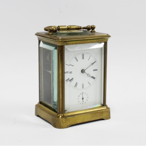 433 - Brass cased carriage clock, striking on a bell, 17cm high, including handle