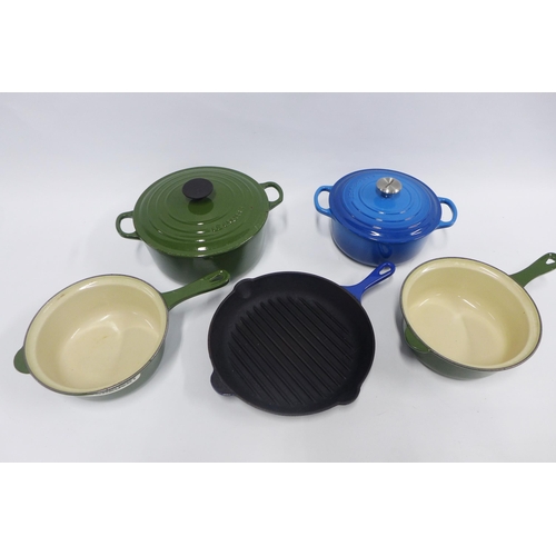 444 - Le Creuset pots and pans in blue and green, 33cm.