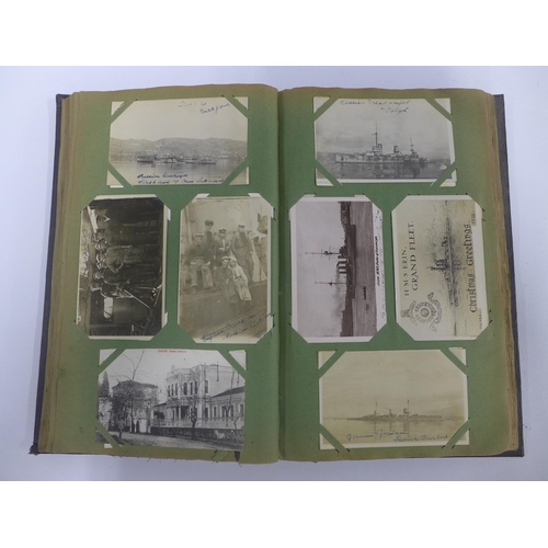 458 - Early 20th century postcard album containing a quantity of postcards