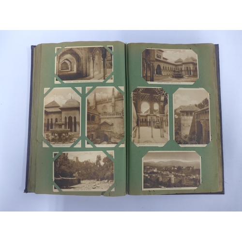 458 - Early 20th century postcard album containing a quantity of postcards