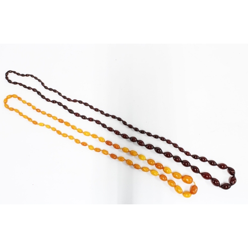 58 - A strand of graduating cherry amber beads, together with a graduating strand of butterscotch amber b... 