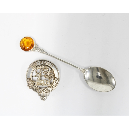 71 - A silver Inverness clan badge by Medlock Criak, Edinburgh 1891 and an Iona style silver coffee spoon... 