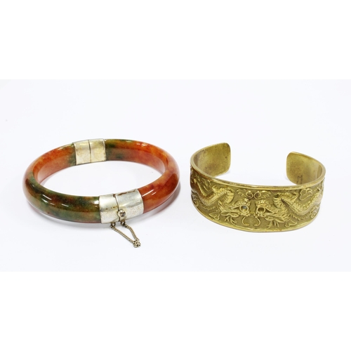 73 - Moss agate coloured jadeite bangle with white metal mounts and a brass dragon pattern  cuff bangle (... 