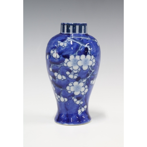 108 - Chinese blue and white prunus pattern vase, with Kangxi marks but likely later, 14cm.