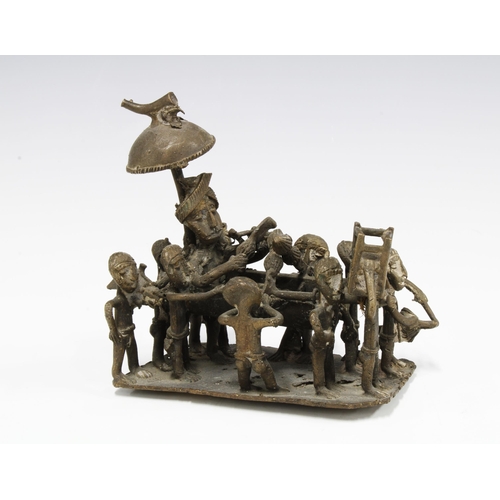 110 - Nigerian bronze group of a procession of figures carrying a dignitary, 11 x 12cm