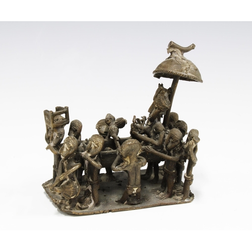 110 - Nigerian bronze group of a procession of figures carrying a dignitary, 11 x 12cm