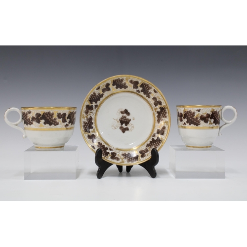 120 - 18th century Worcester Barr trio comprising two cups and a saucer with fruiting vine pattern, saucer... 