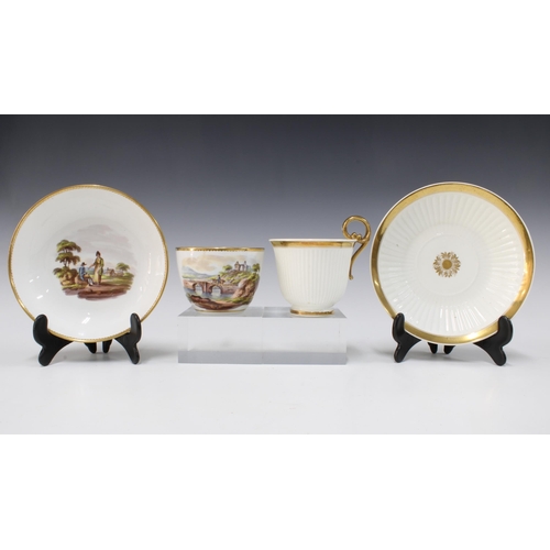 123 - English porcelain Bute shape cup and saucer painted with a topographical scene with bridge and figur... 