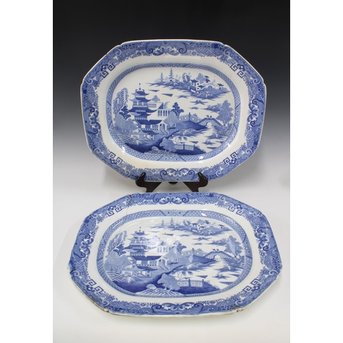 124 - A pair of Willow pattern blue and white ashets (2), 53 x 43cm.