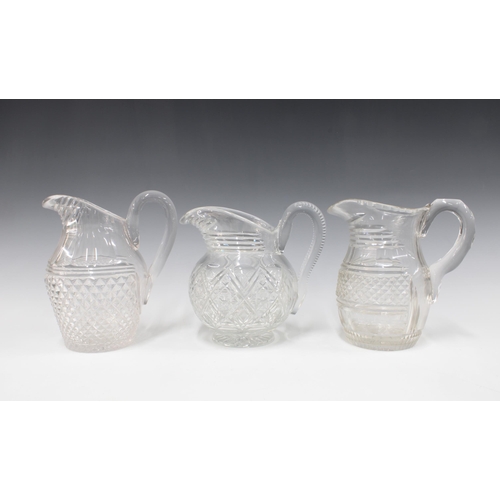 130 - Three 19th century glass water jugs (3) 19cm.