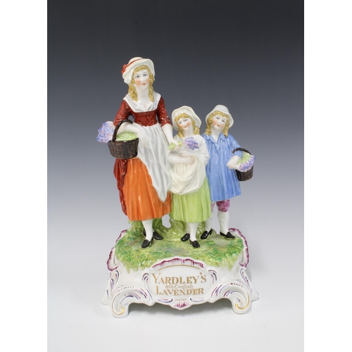 132 - Yardley's Old English Lavender flatback figure group, Dresden backstamp, 20 x 31cm.