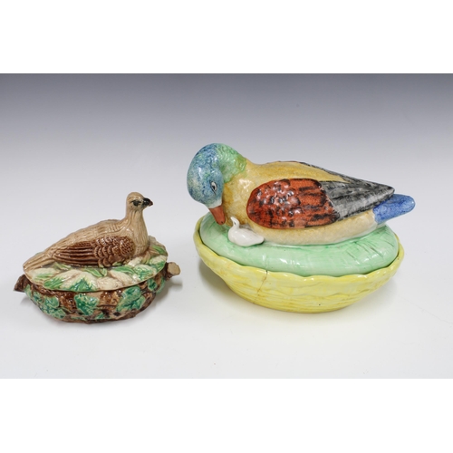 138 - Large Staffordshire duck and duckling tureen (with damages) and a majolica partridge on nest tureen ... 