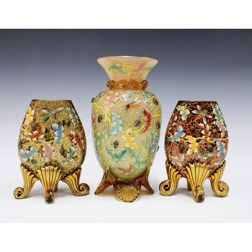 141 - A group of late 19th / early 20th century Moser glass to include a vase and two smaller vases, on ou... 