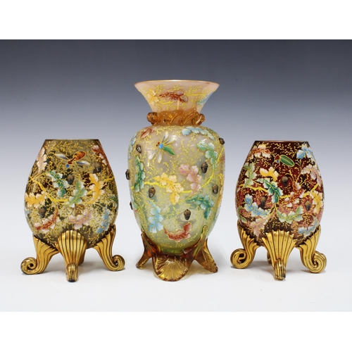 141 - A group of late 19th / early 20th century Moser glass to include a vase and two smaller vases, on ou... 