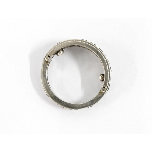15 - An Art Deco white metal 'Day & Night' hinged full eternity ring, with  a central band half set with ... 