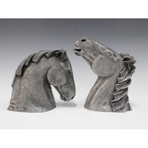 150 - A pair of contemporary horse head sculptures in silvered resin (2) 19cm.