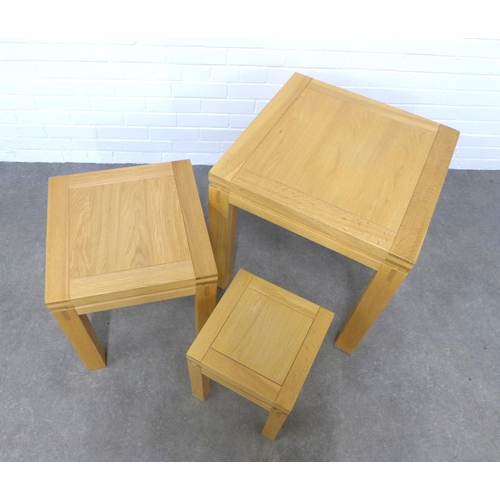 204 - Contemporary nest of three beechwood tables, 60 x 61 x 61cm. (3)