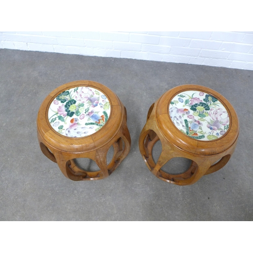 205 - Pair of chinoiserie barrel shaped round stools/tables, with glazed tops, 42 x 45cm. (2)