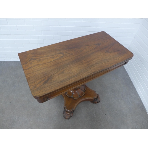 206 - William IV rosewood tea table, fold over swivel top on a baluster column with platform base and leaf... 