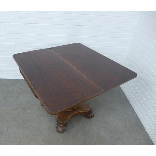 206 - William IV rosewood tea table, fold over swivel top on a baluster column with platform base and leaf... 