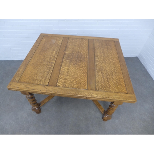 213 - Oak extending table, 213 x 76 x 106cm.