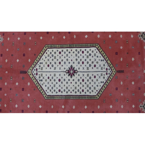 220 - 20th century Moroccan carpet / large rug, rose field with an hexagonal medallion in ivory, multiple ... 